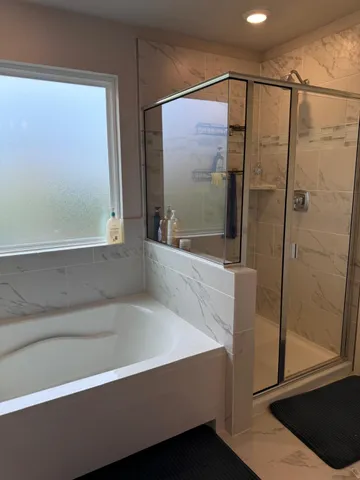 a bathroom with a sink vanity and a mirror
