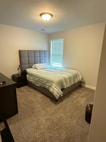 a large bed sitting in a room