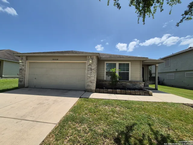 a front view of house with yard