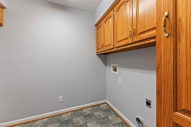 a view of door with washer and dryer