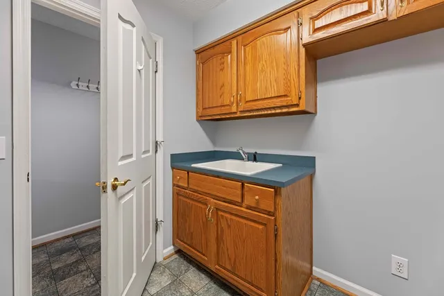 a utility room with a sink
