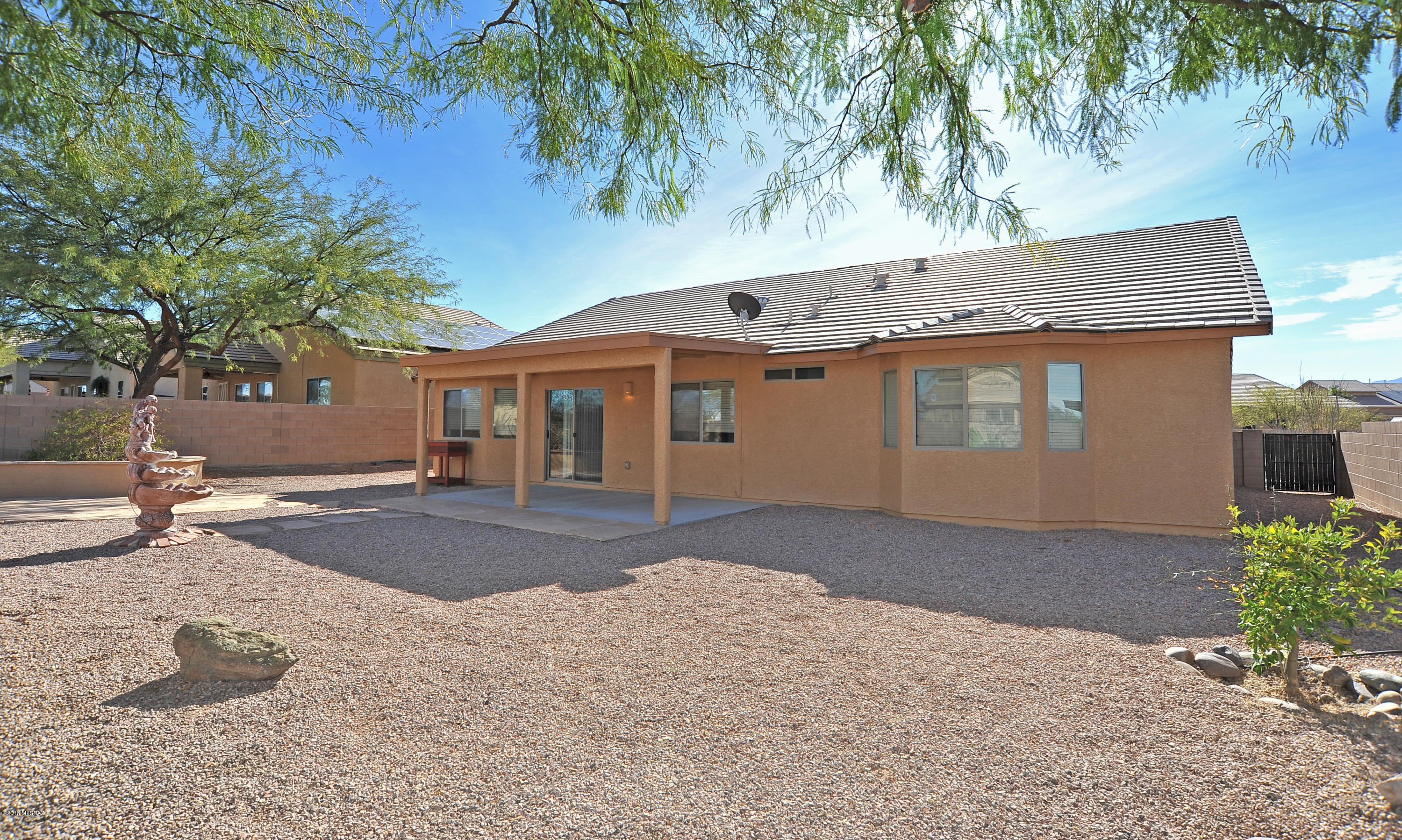 558 West Chatfield Street Vail, AZ 85641 - Photo 27 of 31 a front view of a house with a yard and garage