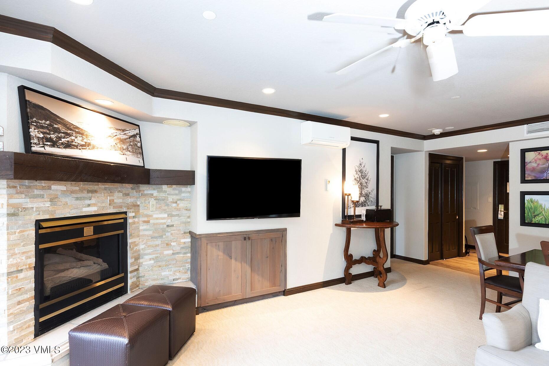 210 Offerson Road, Unit R214 WEEK 36 Beaver Creek, CO 81620 - Photo 2 of 19 a living room with furniture and a flat screen tv