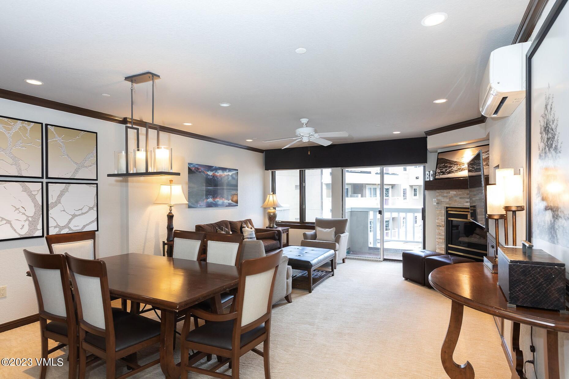 210 Offerson Road, Unit R214 WEEK 36 Beaver Creek, CO 81620 - Photo 3 of 19 a living room with fireplace furniture and a large window