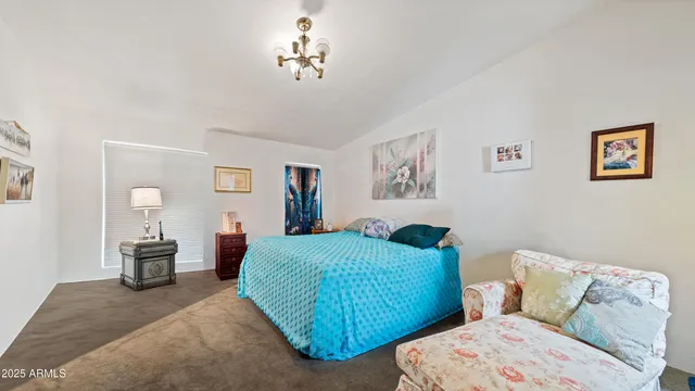 a bathroom with a sink double vanity granite and a mirror