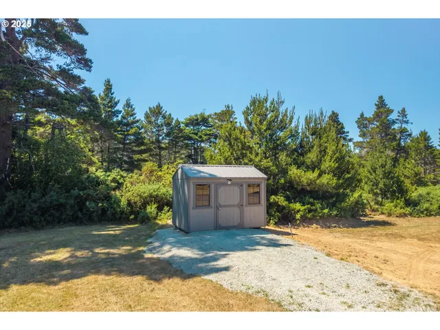 a view of a porch with furniture and front door