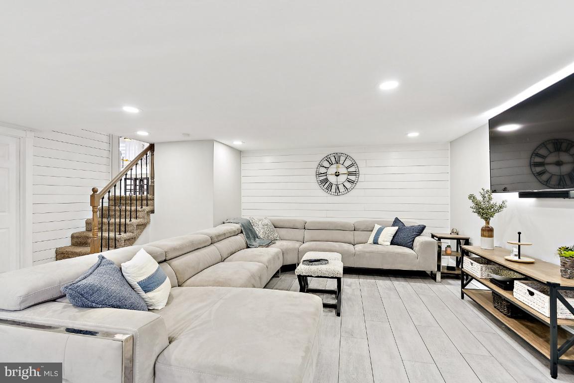 13 Belmont Road Bellmawr, NJ 08031 - Photo 19 of 32 a living room with furniture and a flat screen tv