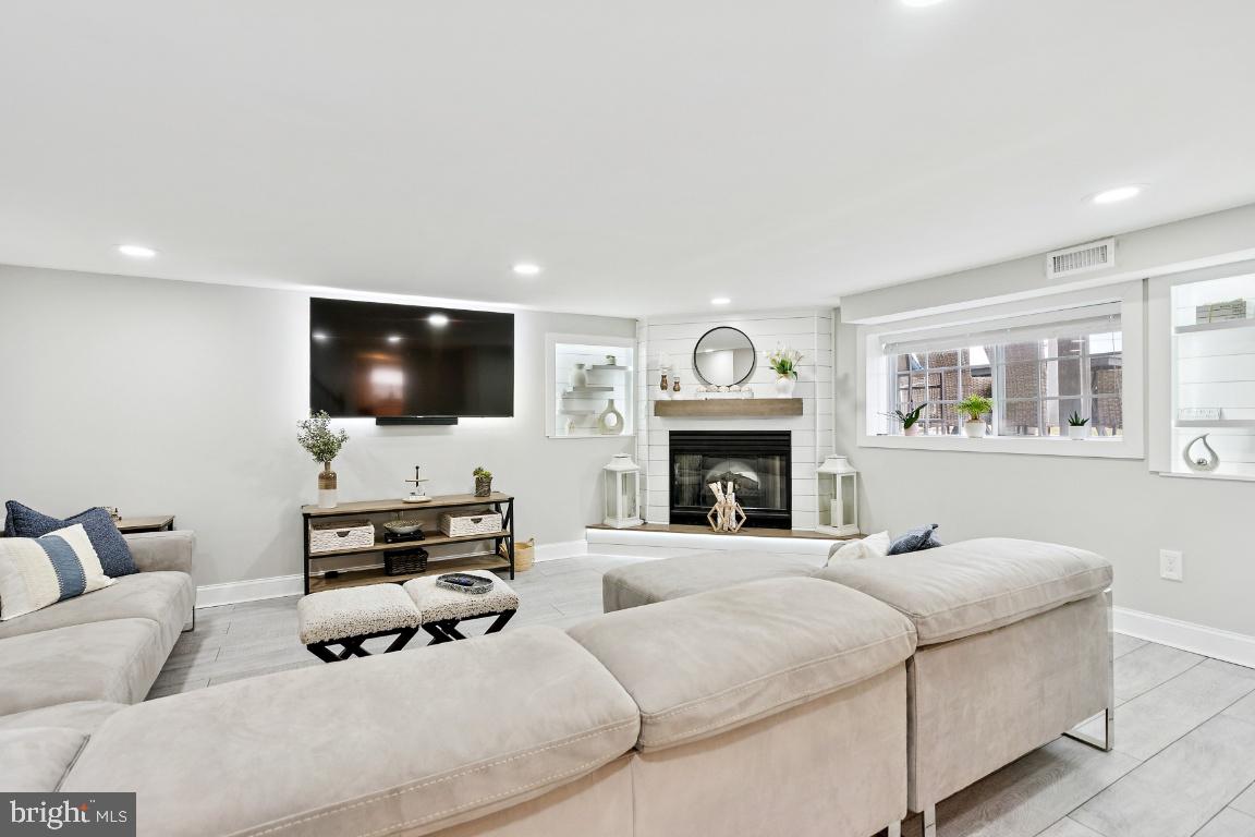 13 Belmont Road Bellmawr, NJ 08031 - Photo 20 of 32 a living room with furniture and a flat screen tv