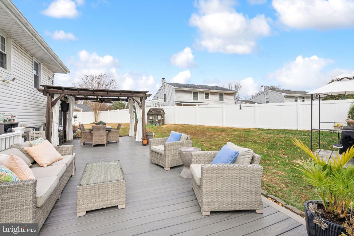 13 Belmont Road Bellmawr, NJ 08031 - Photo 21 of 32 a view of living room and patio with swimming pool