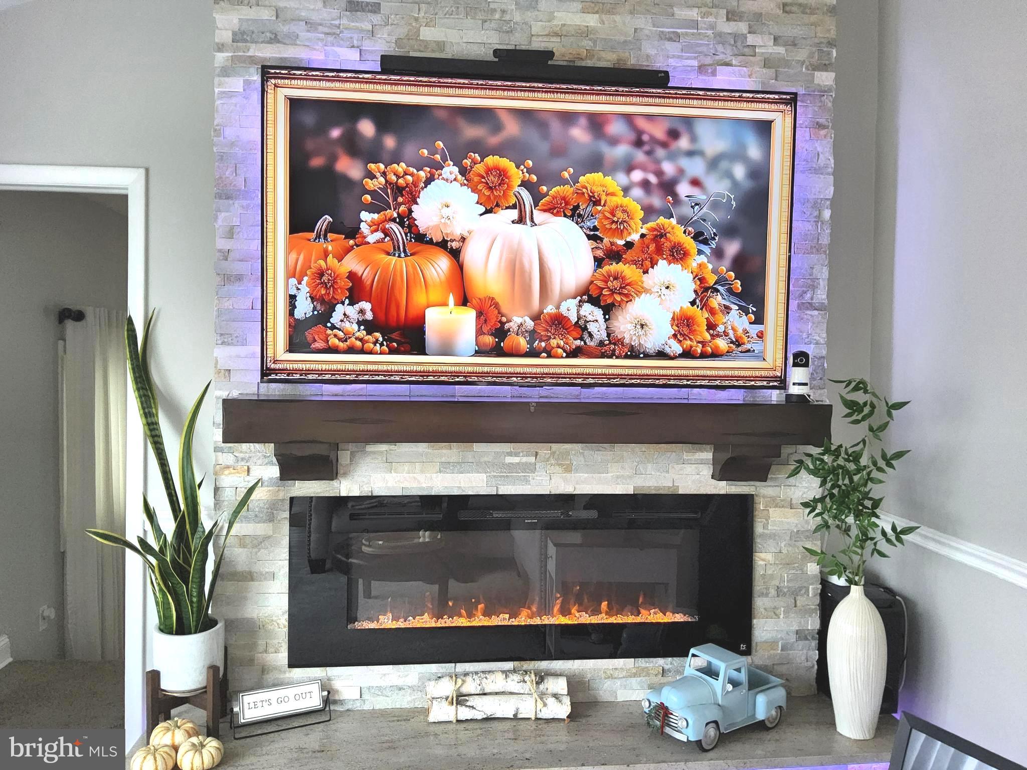 13 Belmont Road Bellmawr, NJ 08031 - Photo 26 of 32 a fireplace with painting on the wall