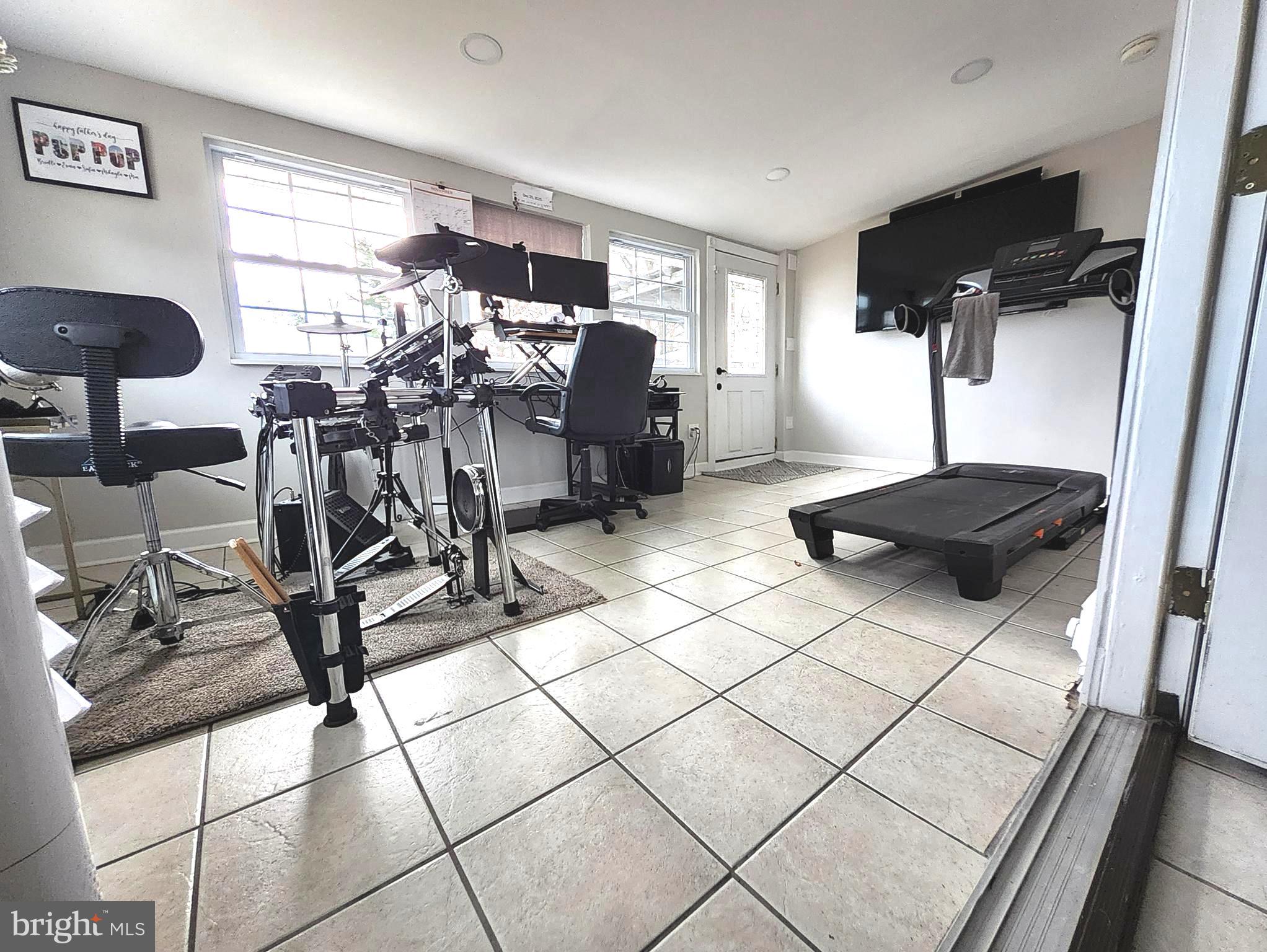 13 Belmont Road Bellmawr, NJ 08031 - Photo 28 of 32 a living room with a couch and a table
