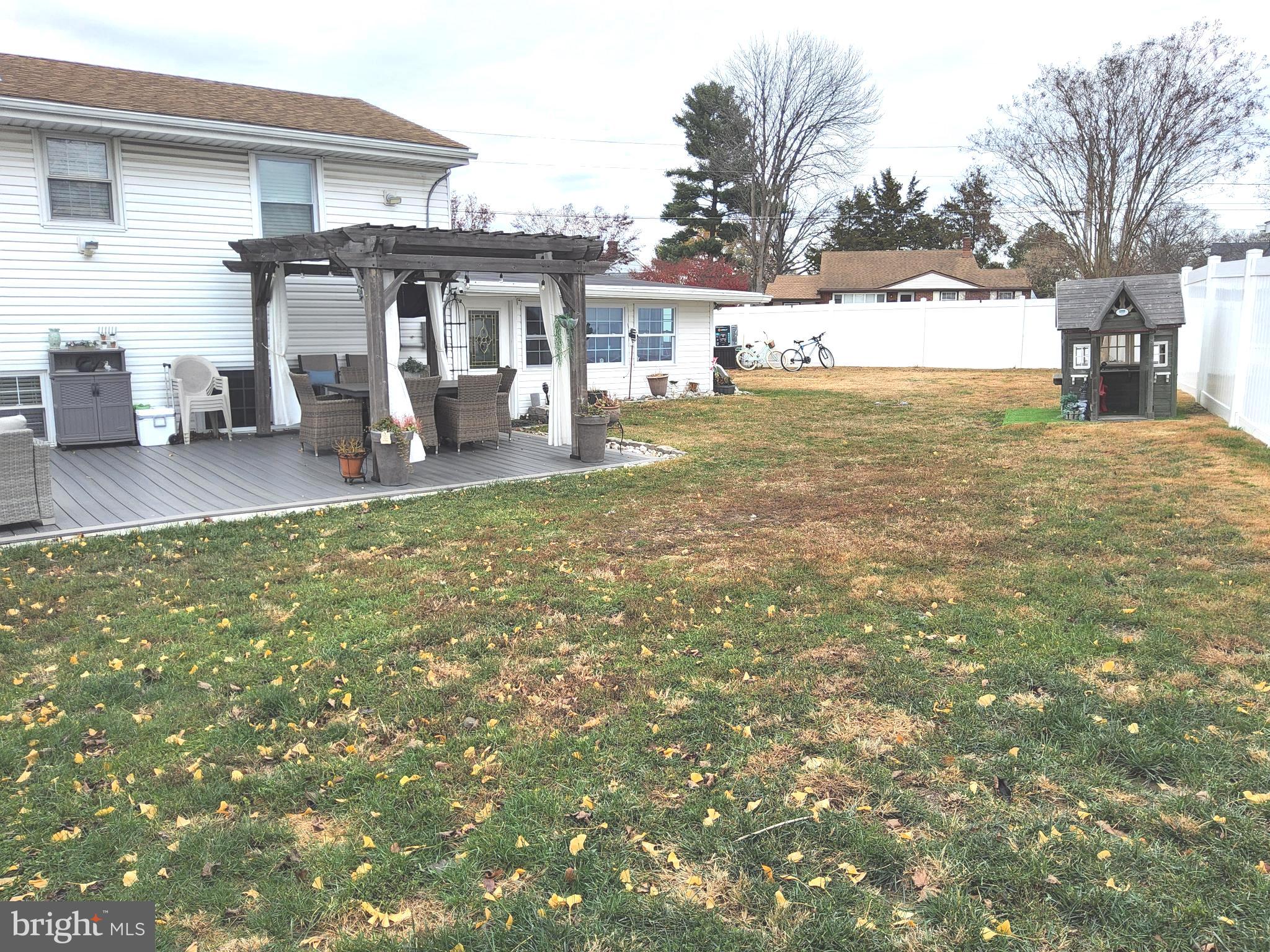 13 Belmont Road Bellmawr, NJ 08031 - Photo 32 of 32 a view of a house with backyard and a tree