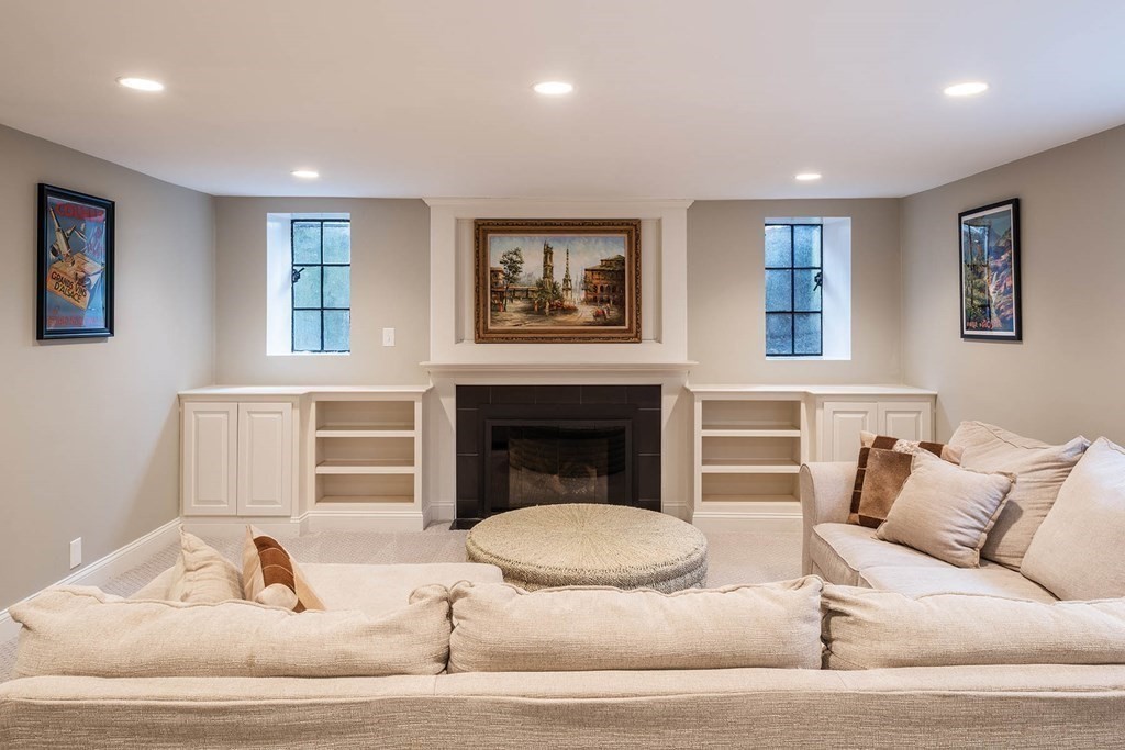92 Gordon Road Newton, MA 02468 - Photo 13 of 16 a living room with furniture and a fireplace