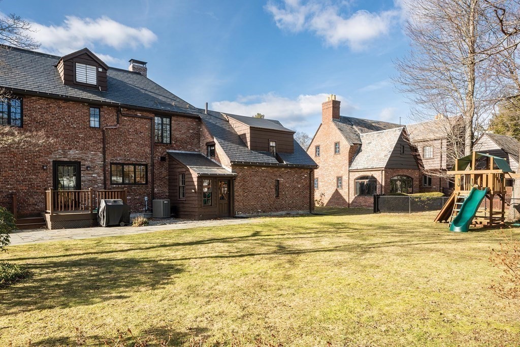 92 Gordon Road Newton, MA 02468 - Photo 14 of 16 a view of a house with a swimming pool