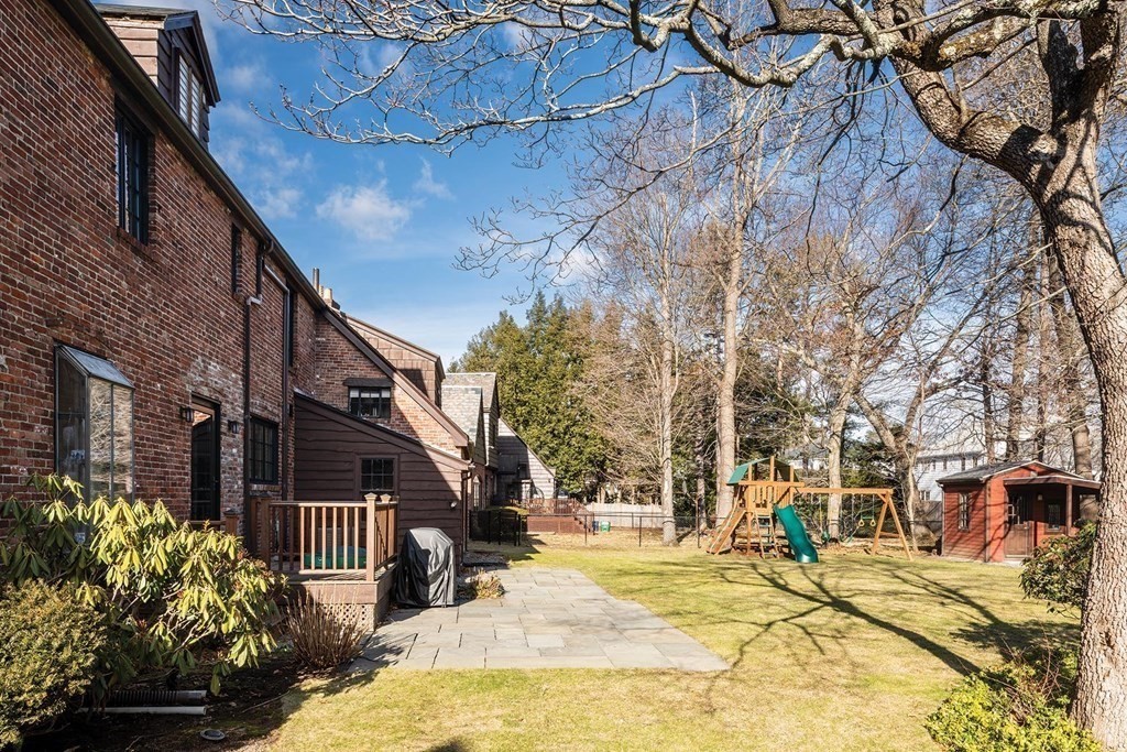 92 Gordon Road Newton, MA 02468 - Photo 15 of 16 a view of a swimming pool with a patio
