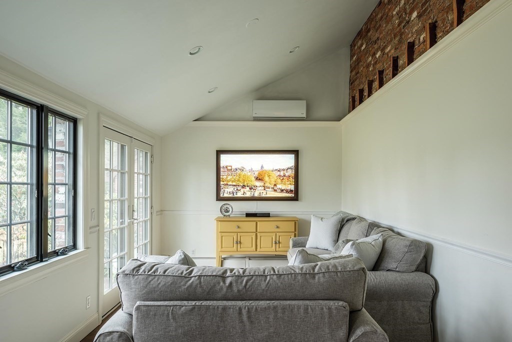 92 Gordon Road Newton, MA 02468 - Photo 7 of 16 a view of a livingroom with furniture and windows