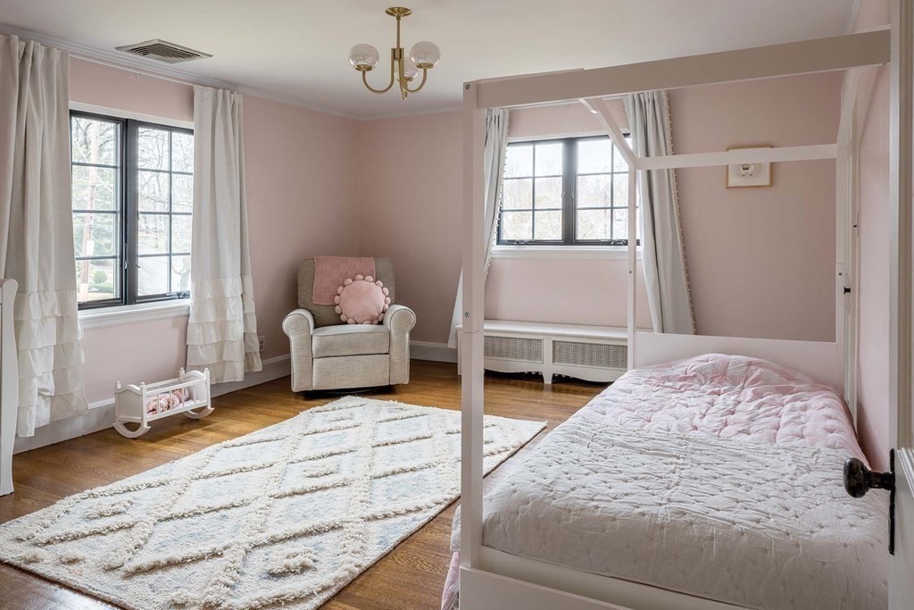92 Gordon Road Newton, MA 02468 - Photo 9 of 16 a spacious bedroom with a bed and a window