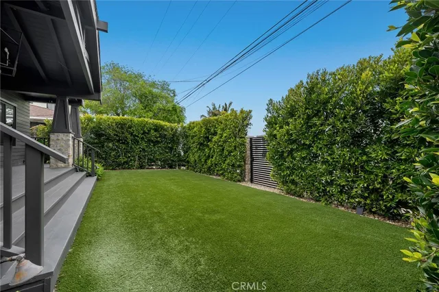 a bathroom with a double vanity sink mirror and bathtub