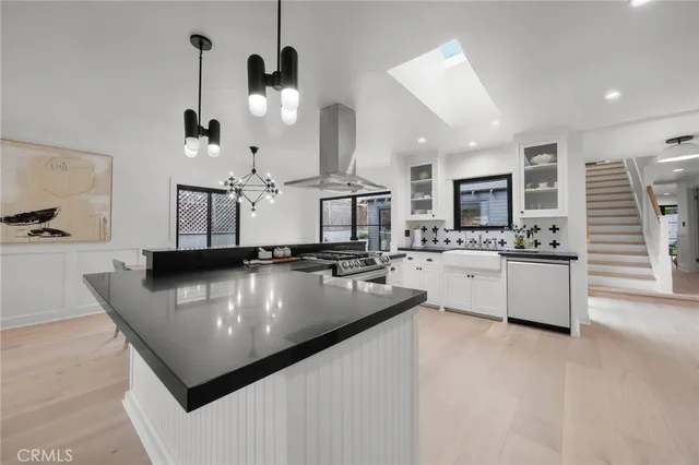 a bedroom with furniture and a fireplace