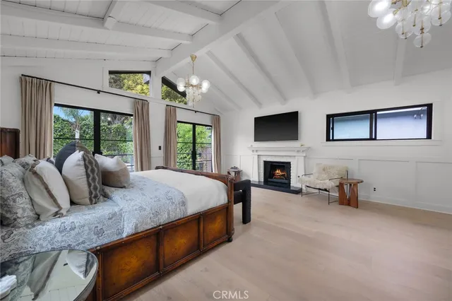 a spacious bathroom with double vanity and a mirror