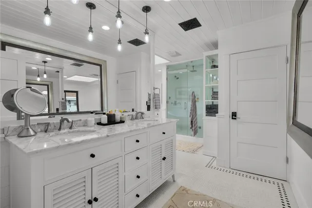 a bedroom with a bed and a painting