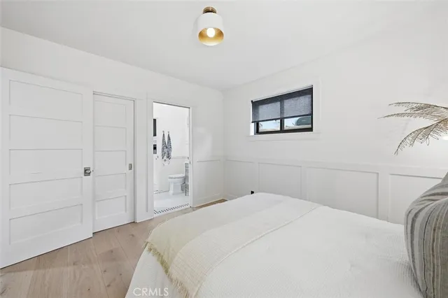 a view of patio with chairs and potted plants