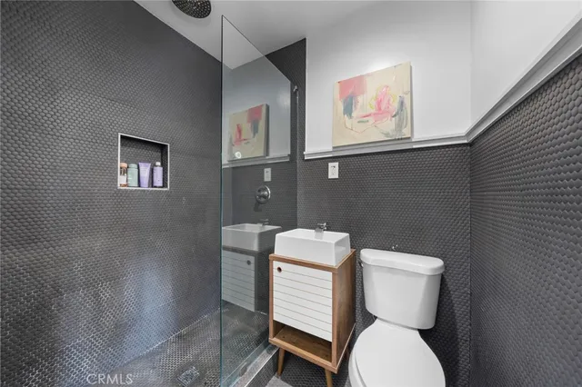 a swimming pool with outdoor seating and yard