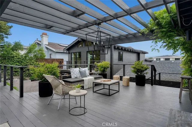 a view of a swimming pool with outdoor seating
