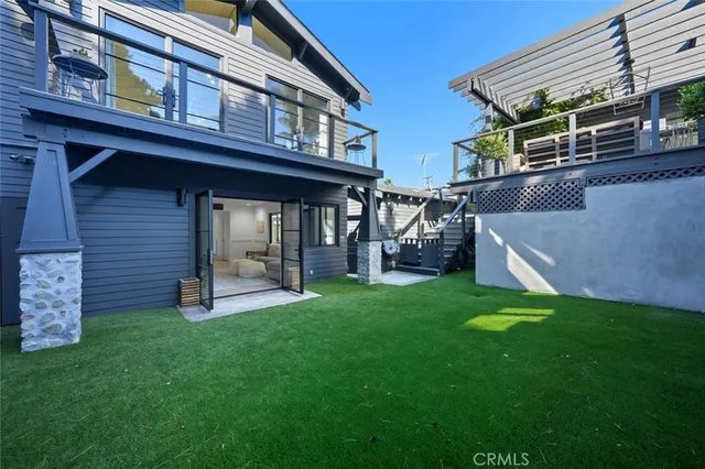 a swimming pool with trees in the background