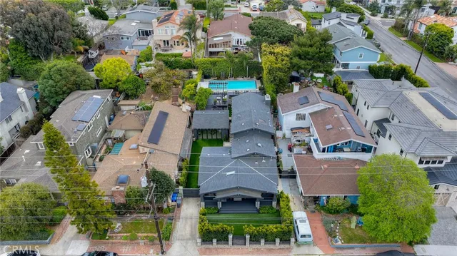 an aerial view of a house with a garden