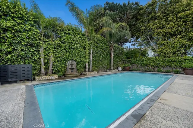 an aerial view of residential house with outdoor space