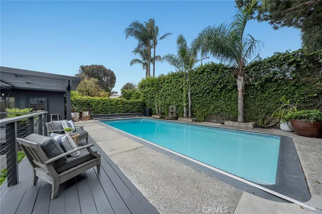 an aerial view of a house with a yard and outdoor space