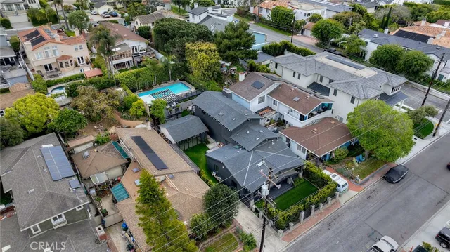 a view of a porch with furniture and a yard