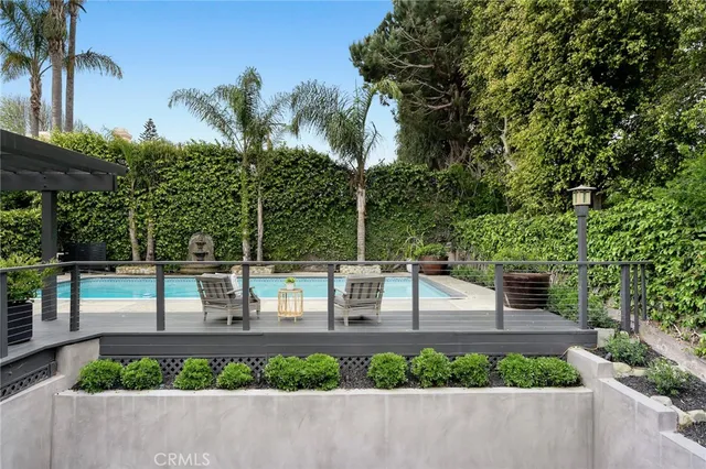 a outdoor living space with furniture and garden view