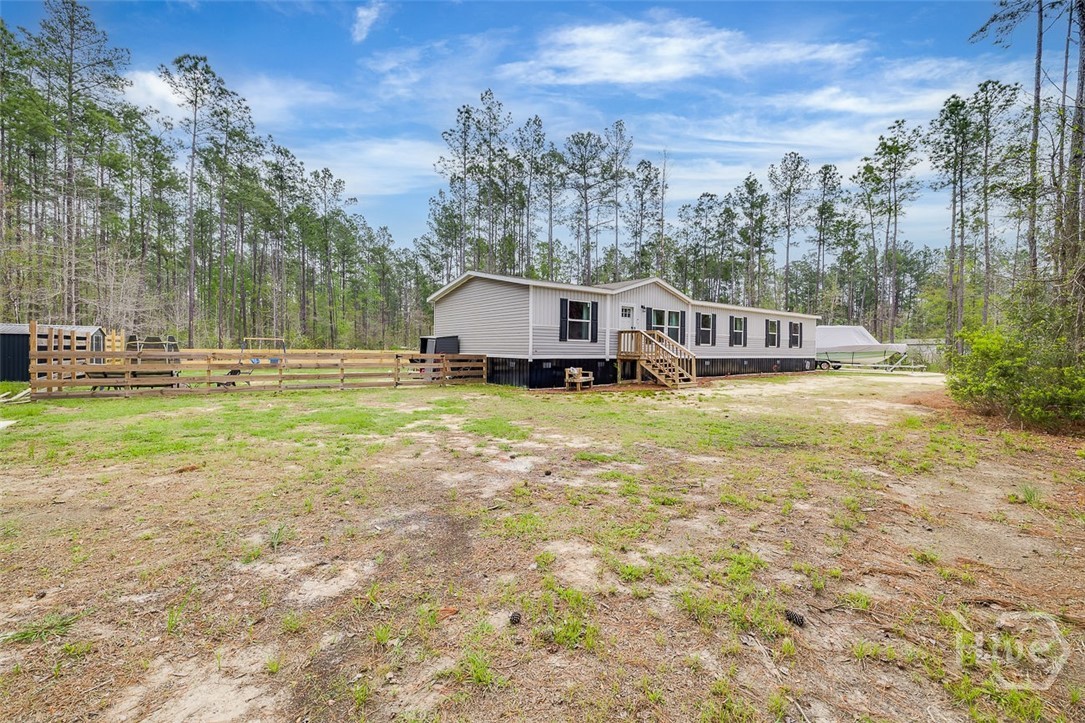69 Babe Landon Lane Fleming, GA 31309 - Photo 2 of 48 Left Side Front View