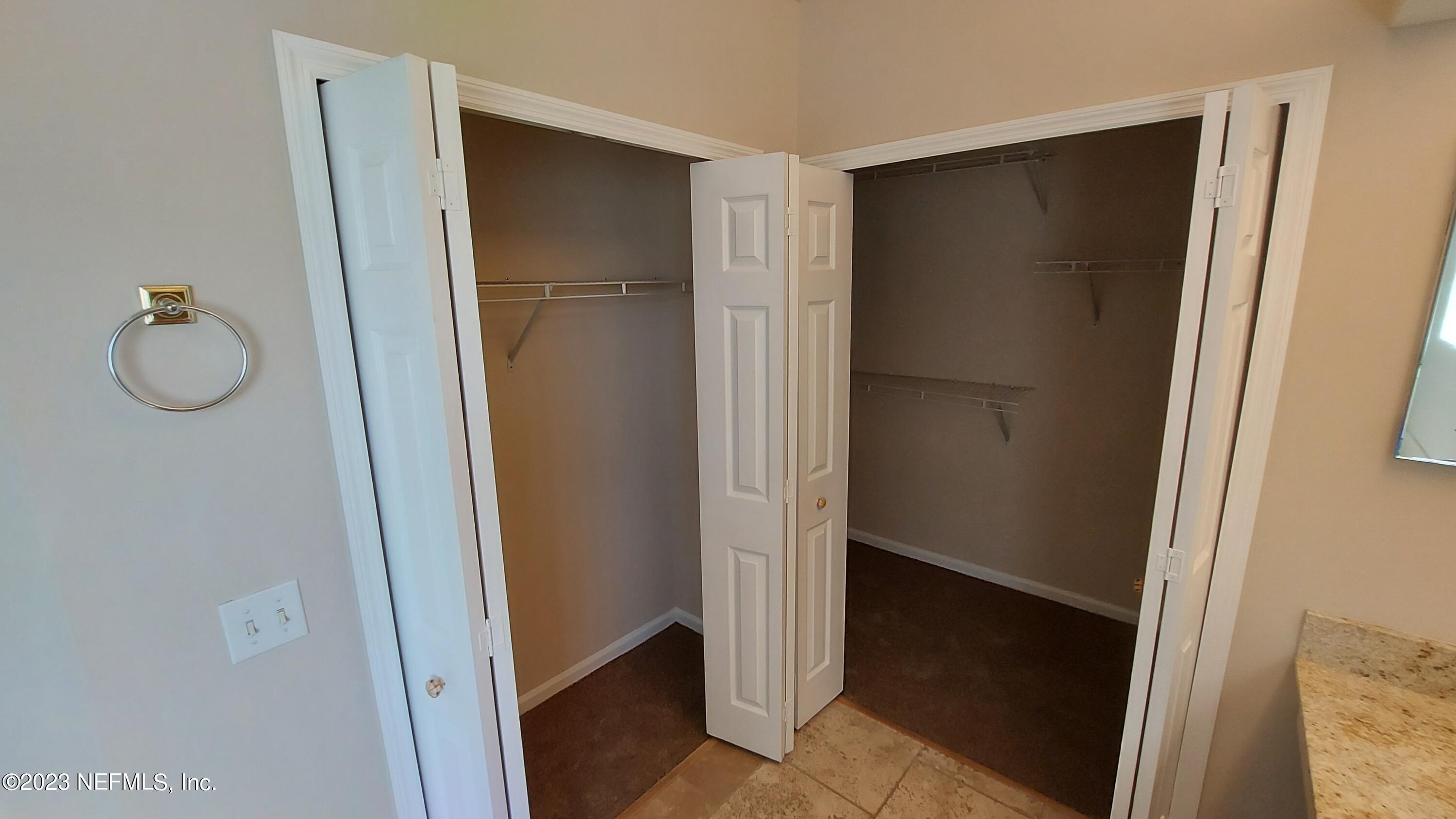 1763 Pickwick Place Orange Park, FL 32003 - Photo 15 of 24 a bathroom with a glass shower door and a sink
