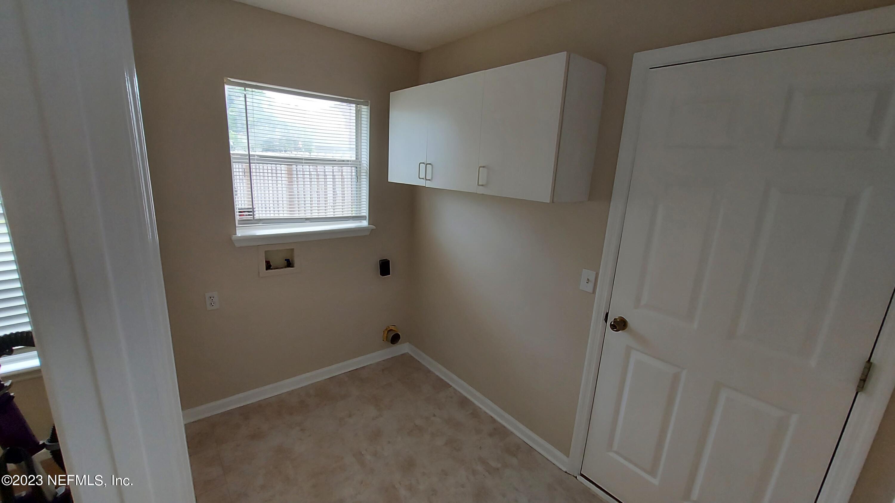 1763 Pickwick Place Orange Park, FL 32003 - Photo 19 of 24 a room that has a window in it