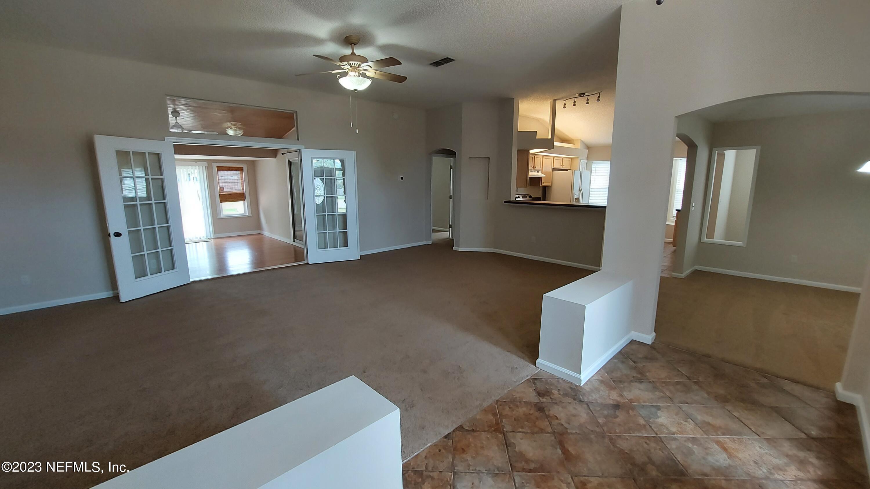 1763 Pickwick Place Orange Park, FL 32003 - Photo 7 of 24 a view of livingroom with hardwood floor and a ceiling fan