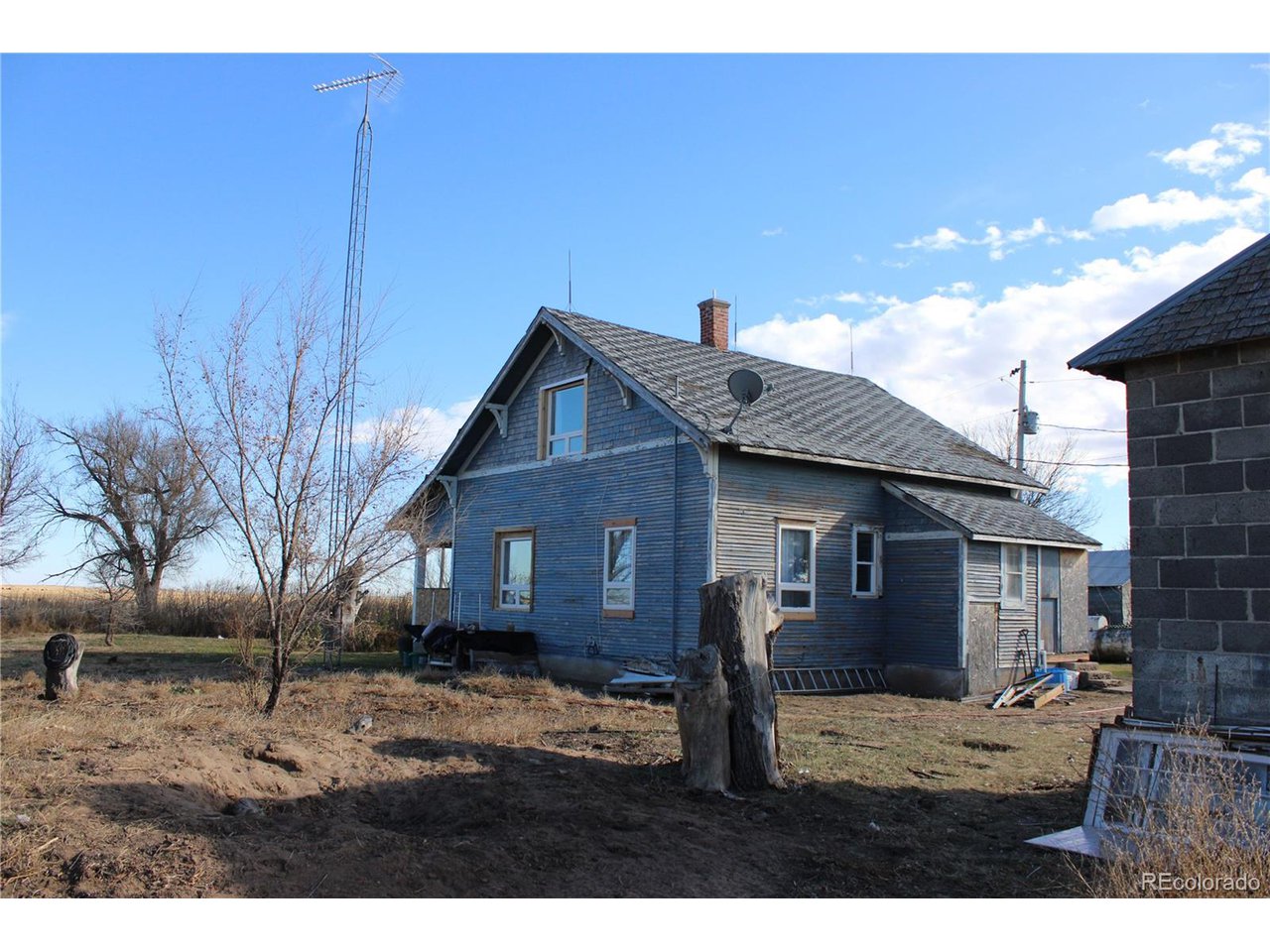 1901 County Rd H Joes, CO 80822 - Photo 17 of 42 a view of a house with a yard