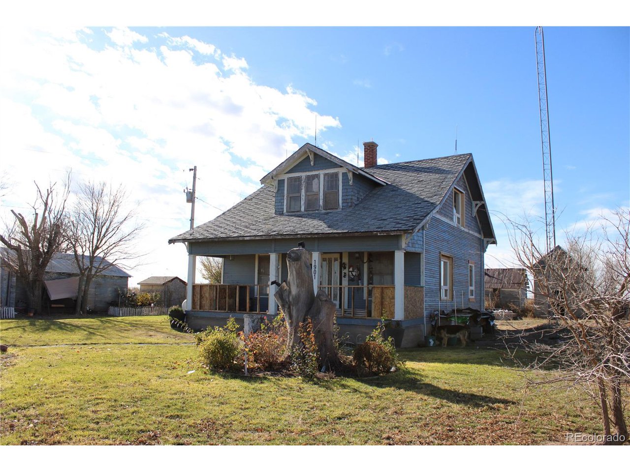 1901 County Rd H Joes, CO 80822 - Photo 2 of 42 a front view of a house with a yard