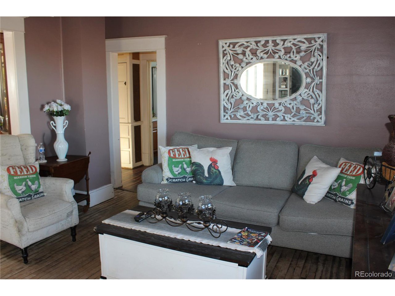 1901 County Rd H Joes, CO 80822 - Photo 31 of 42 a living room with furniture and wooden floor