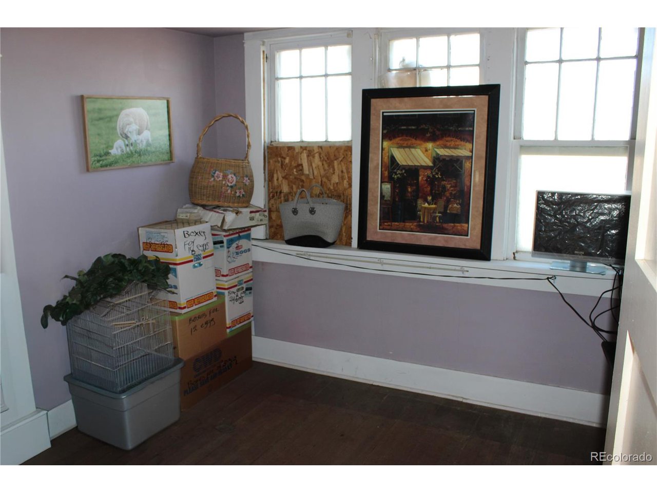 1901 County Rd H Joes, CO 80822 - Photo 40 of 42 a living room with furniture and a fireplace