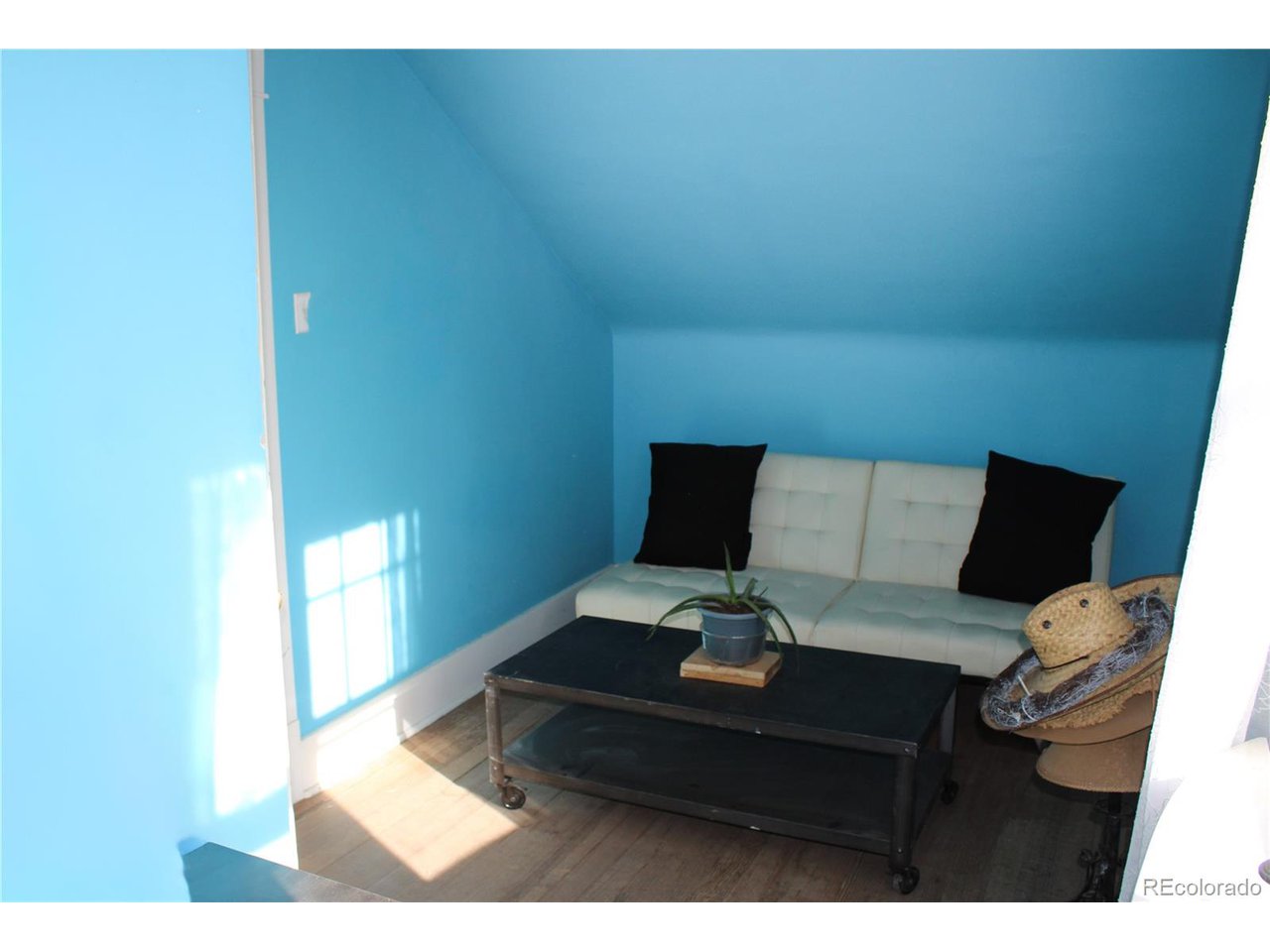 1901 County Rd H Joes, CO 80822 - Photo 42 of 42 a living room with furniture and a couch