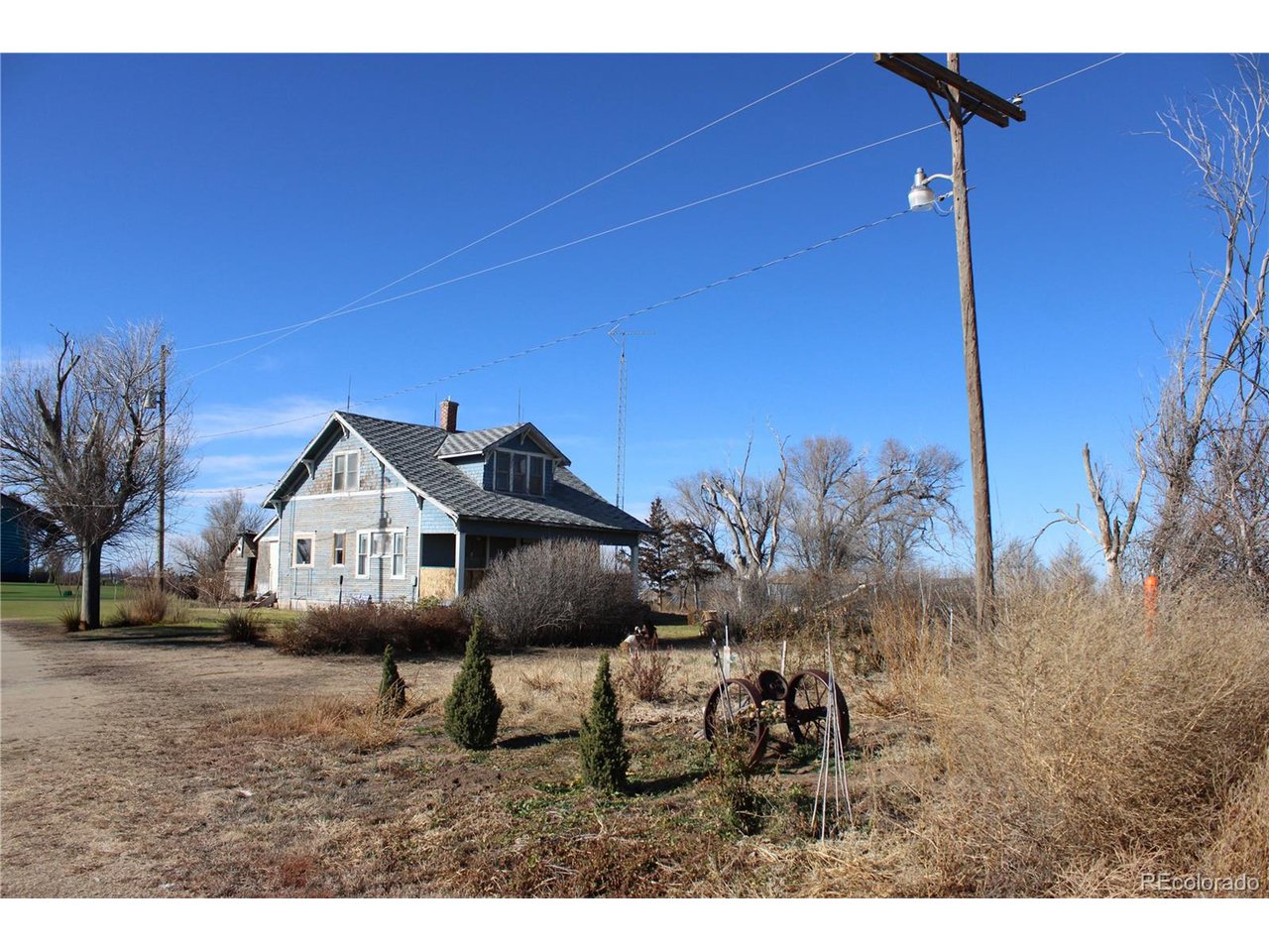 1901 County Rd H Joes, CO 80822 - Photo 6 of 42 a house view with a backyard space