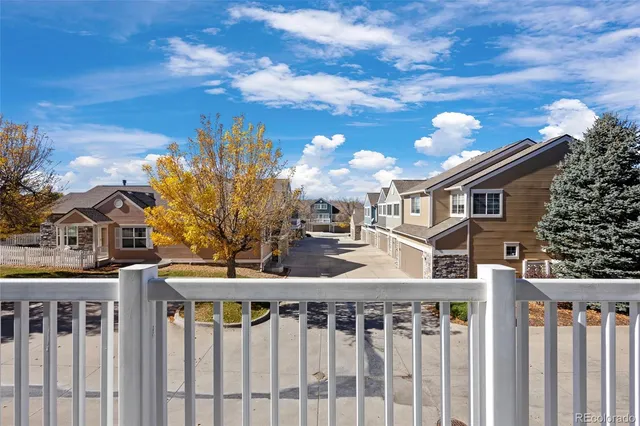 a view of a brick house with a street