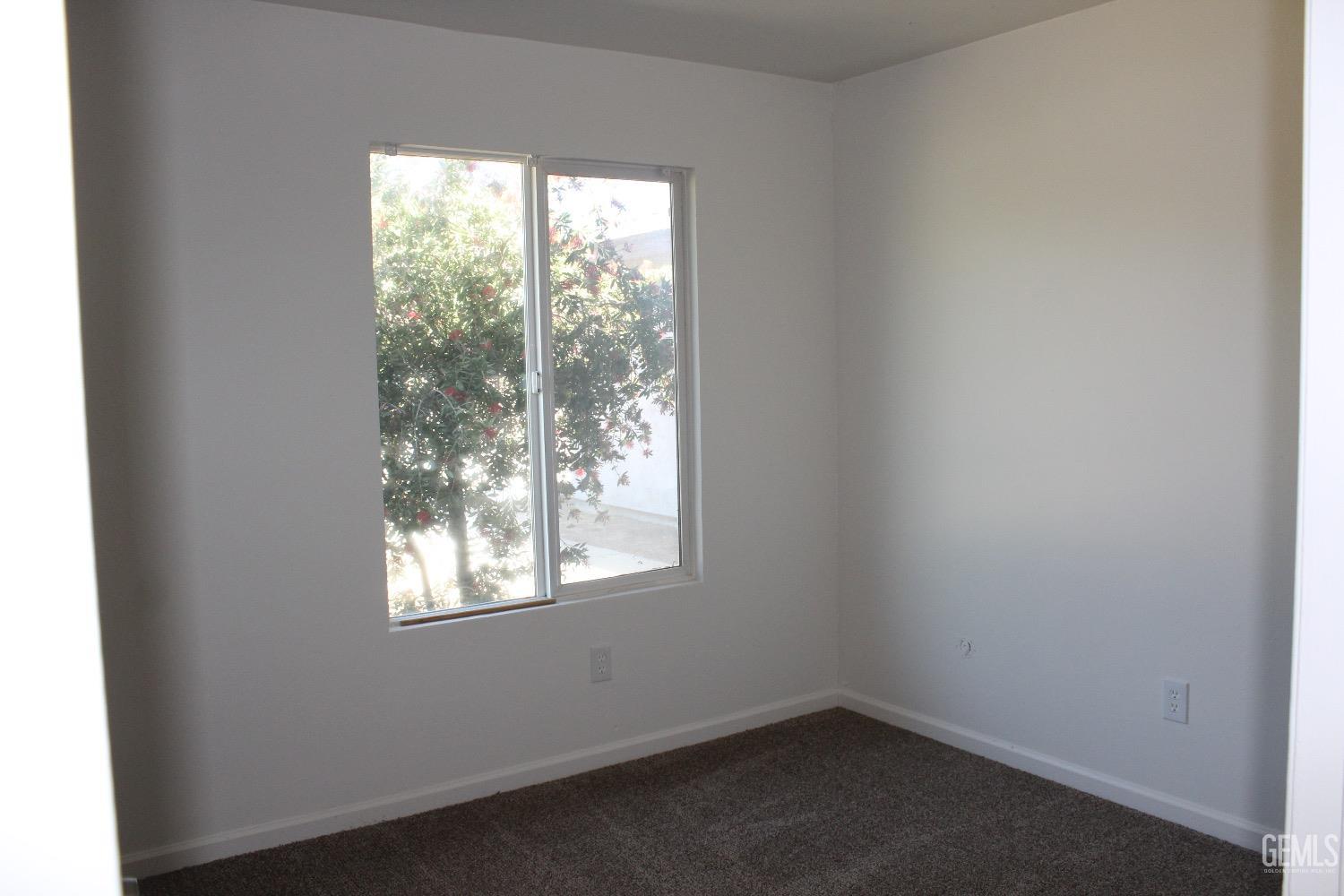 Undisclosed Address Bakersfield, CA 93306 - Photo 4 of 15 an empty room with a window