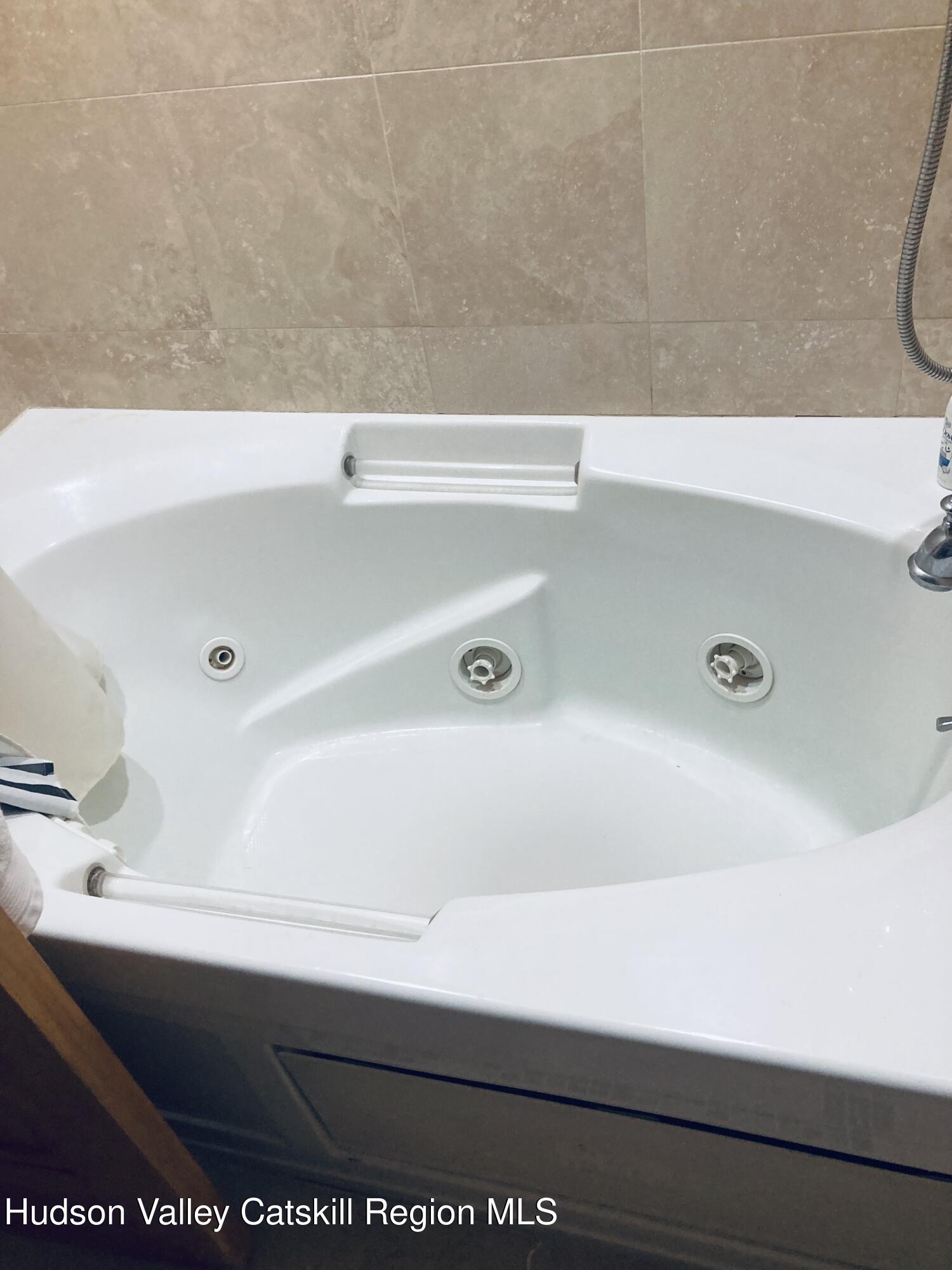 537 Mossy Hill Road Catskill, NY 12414 - Photo 26 of 38 a bathroom with a bathtub