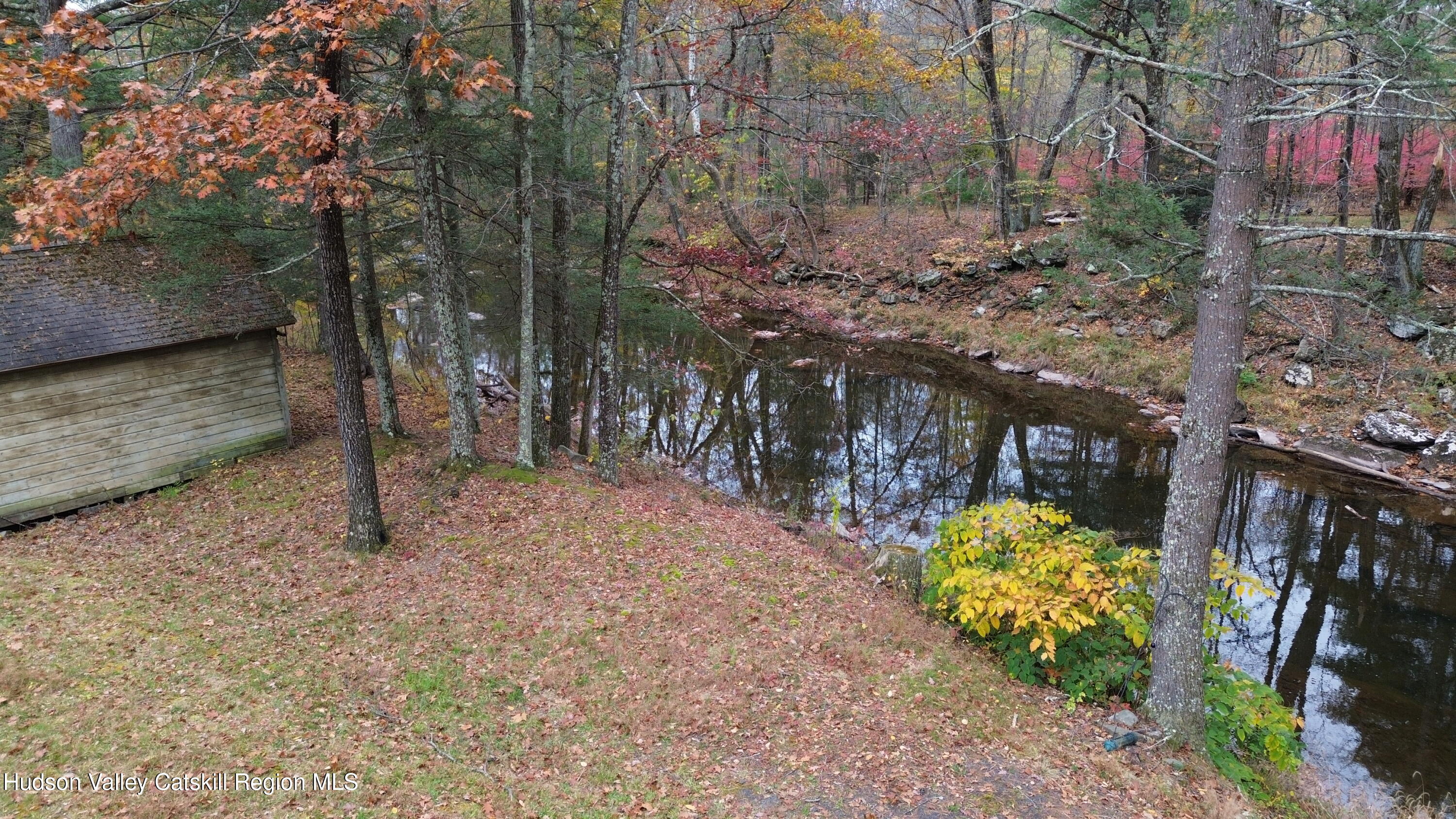 537 Mossy Hill Road Catskill, NY 12414 - Photo 34 of 38 a backyard of a house with lots of green space