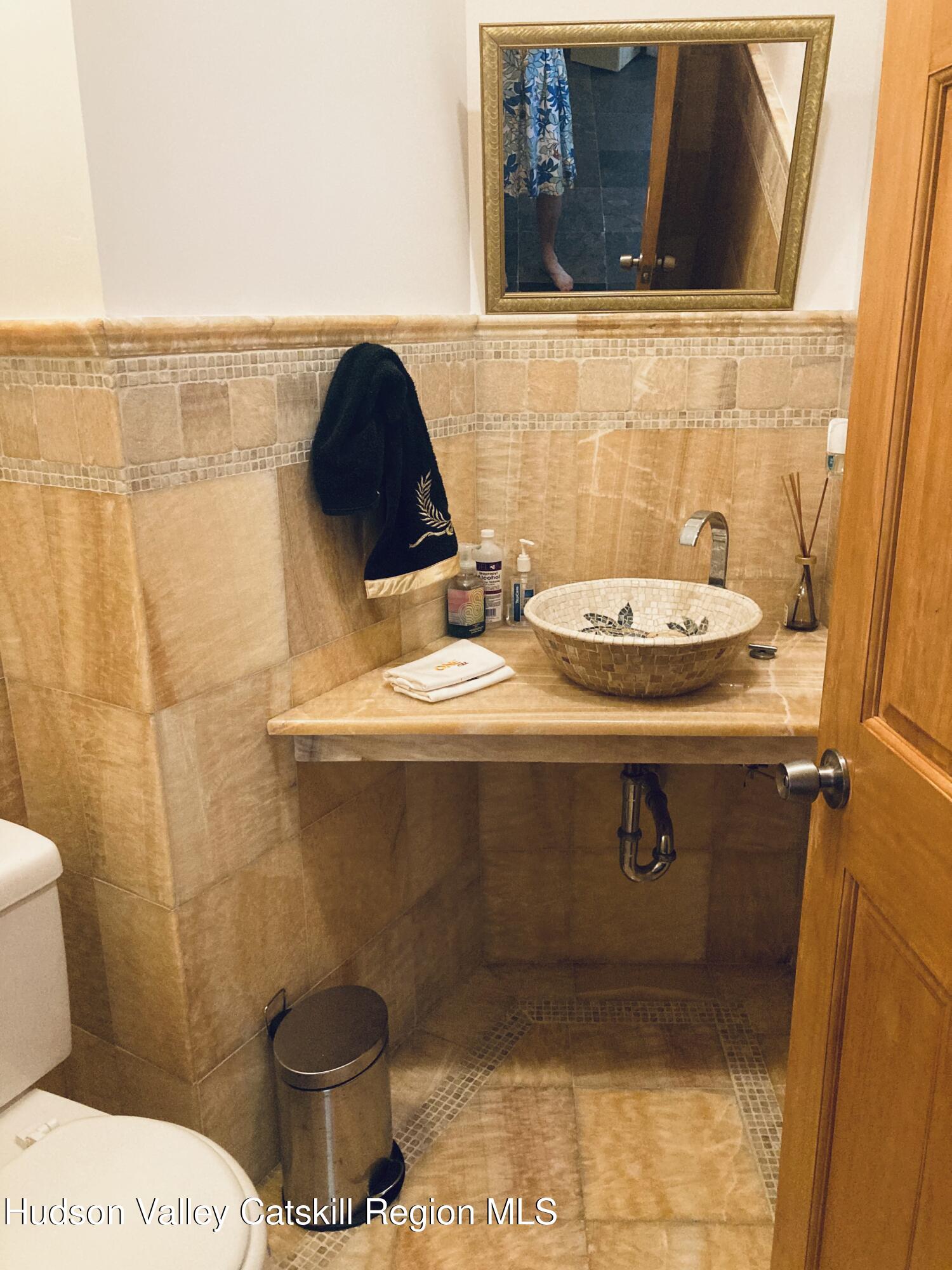 537 Mossy Hill Road Catskill, NY 12414 - Photo 34 of 105 a bathroom with a sink and a toilet