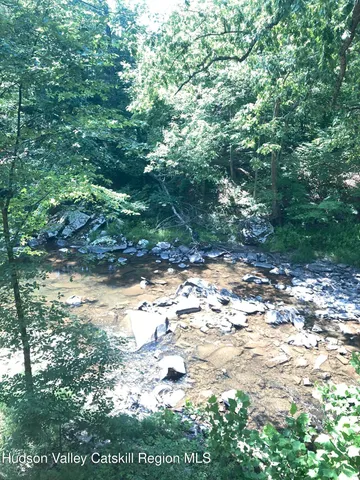 a living room with lots of furniture and rug